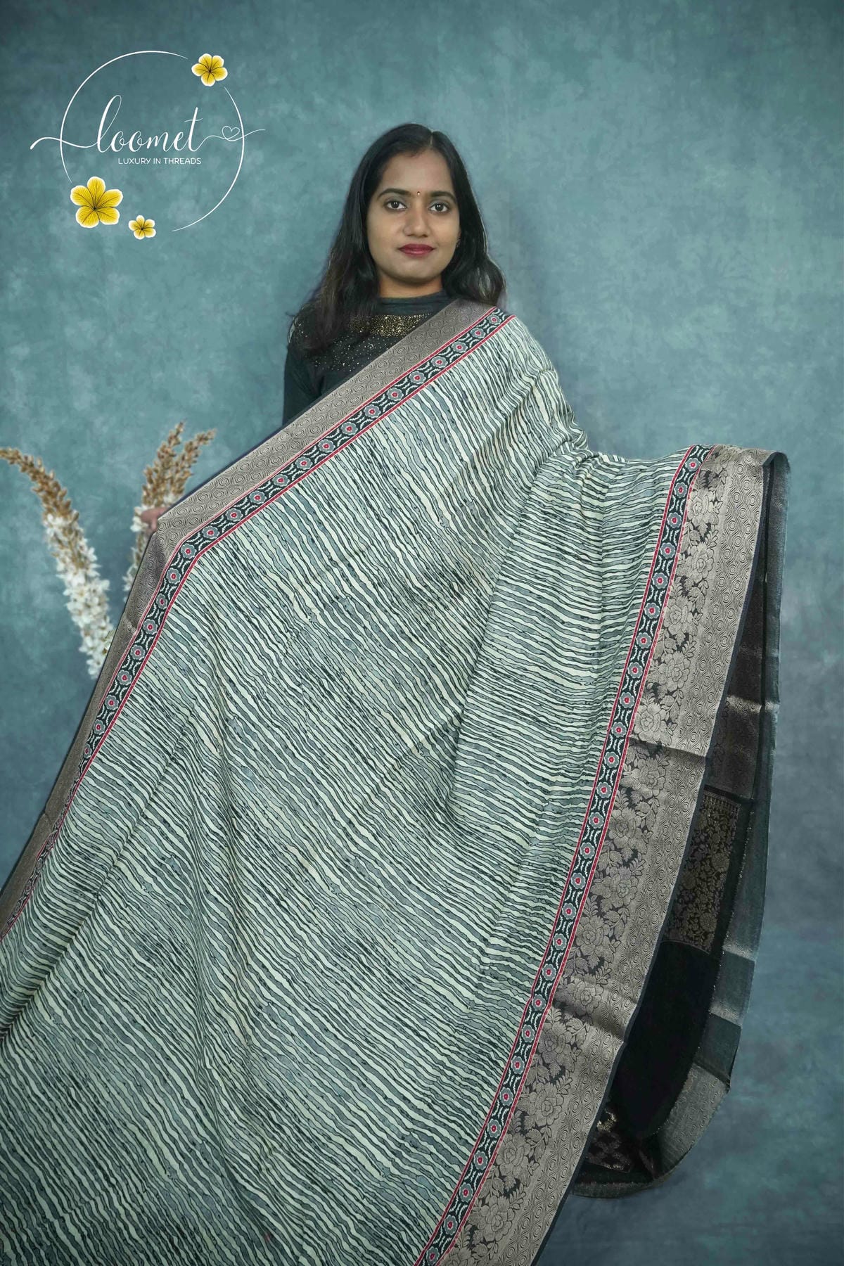 AJF1321 Off-White and Charcoal Grey Viscose saree with brush-stroke wavy pattern.