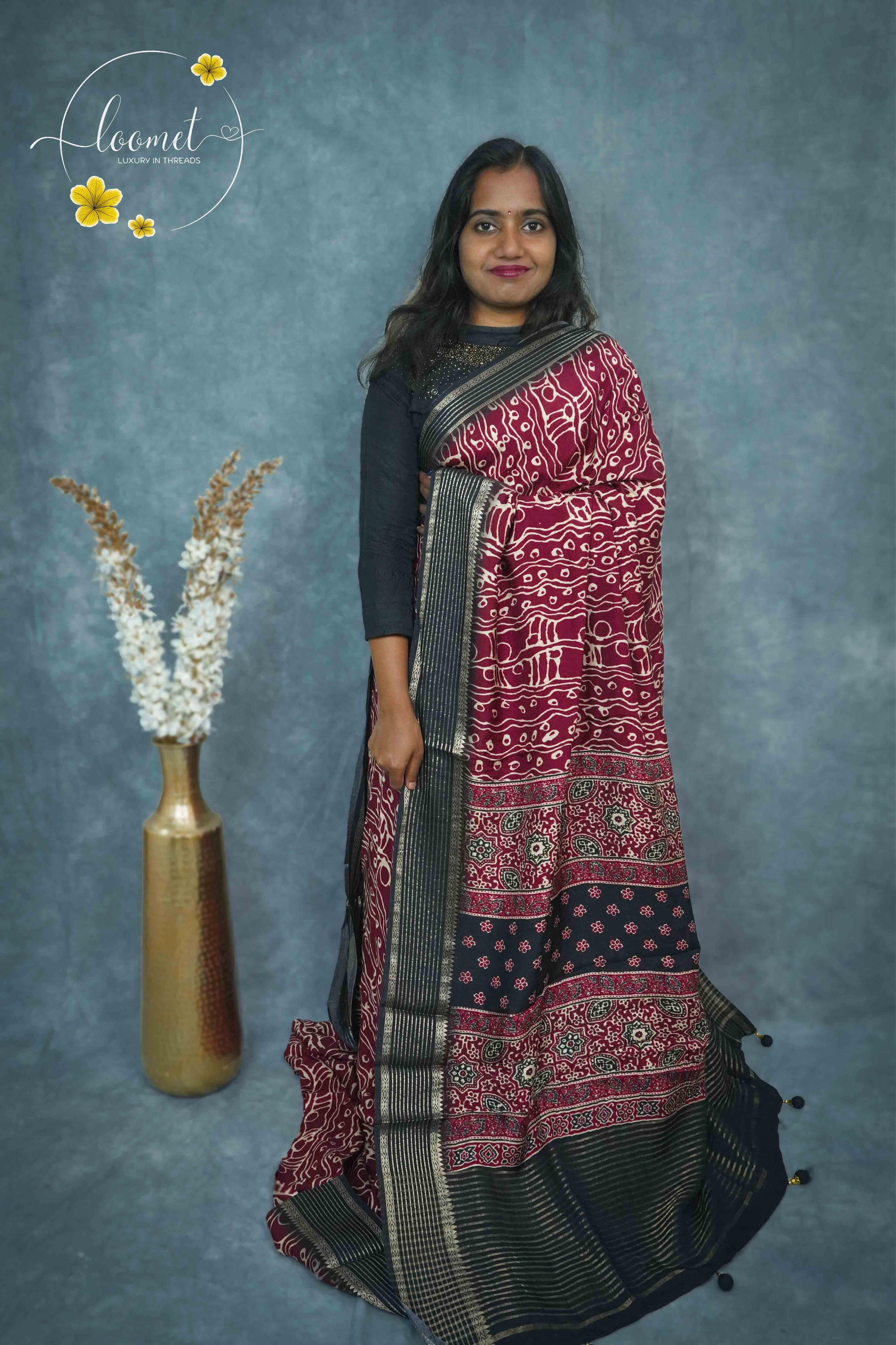 AJF1521 Brick Red and Charcoal Black Viscose saree with abstract batik-style prints.