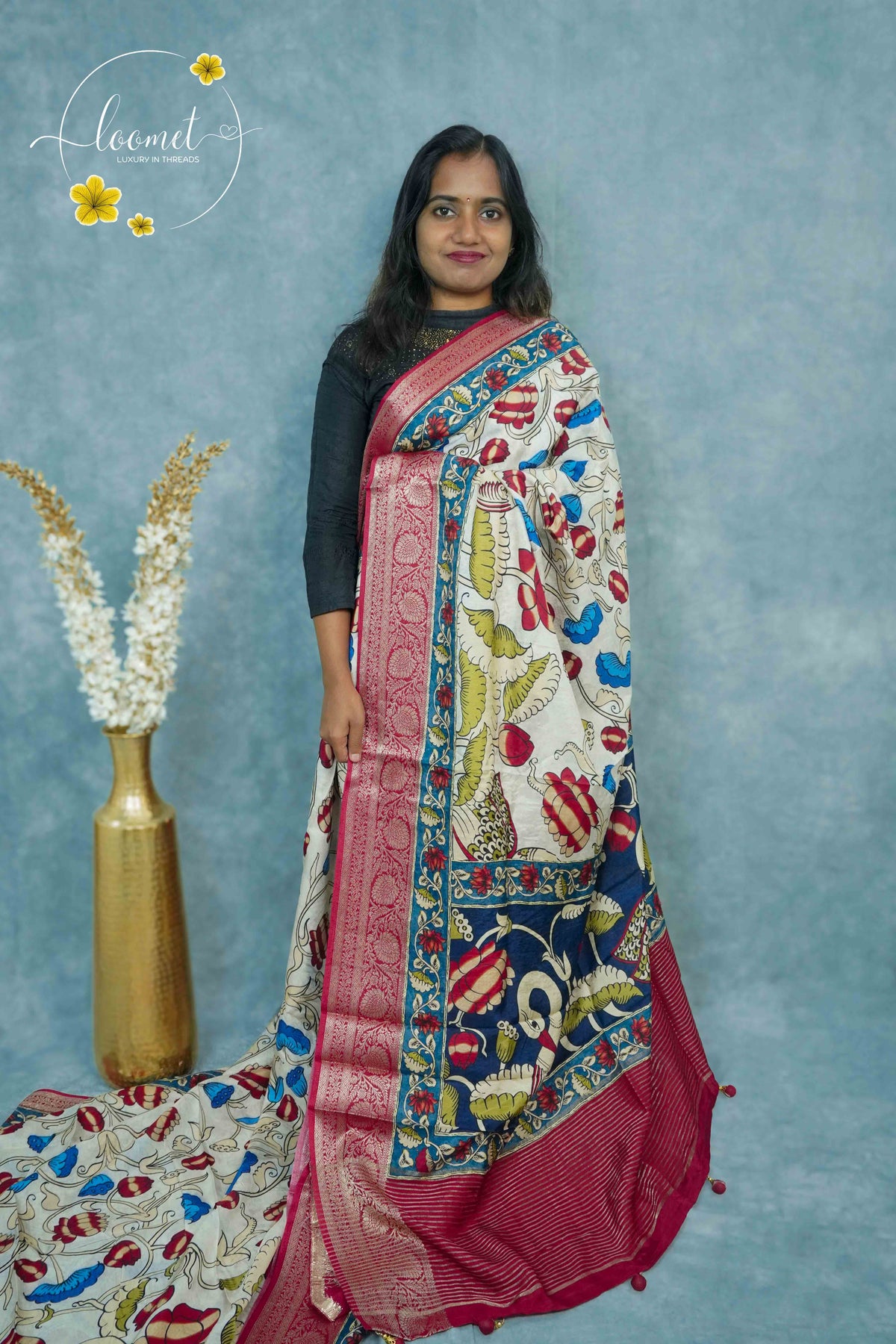 AJF1821 Cream Viscose saree features Kalamkari floral motifs with crimson Banarasi zari border.