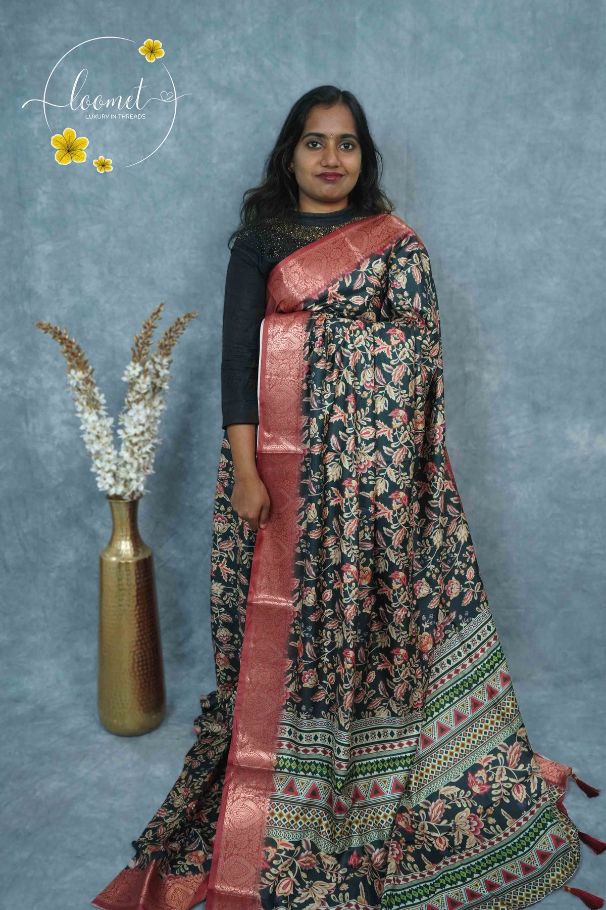 AJF3186 Black Viscose saree features kalamkari floral motifs with banarasi zari border.