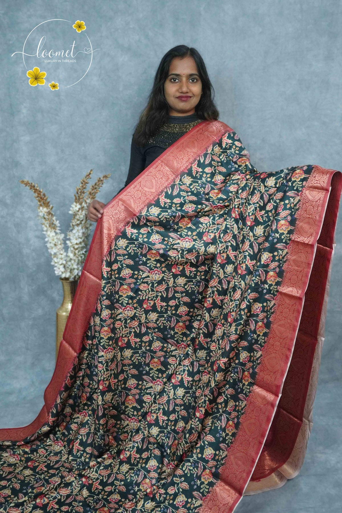 AJF3186 Black Viscose saree features kalamkari floral motifs with banarasi zari border.