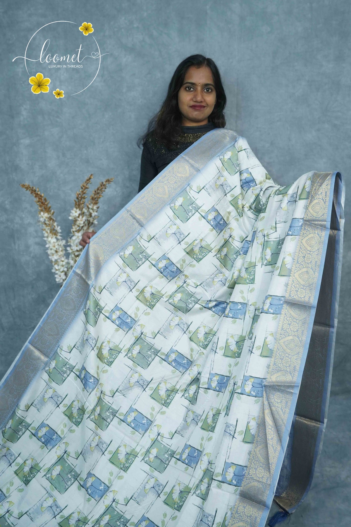 AJF3187 Off-White Viscose saree features pastel geometric prints and silver banarasi zari border.