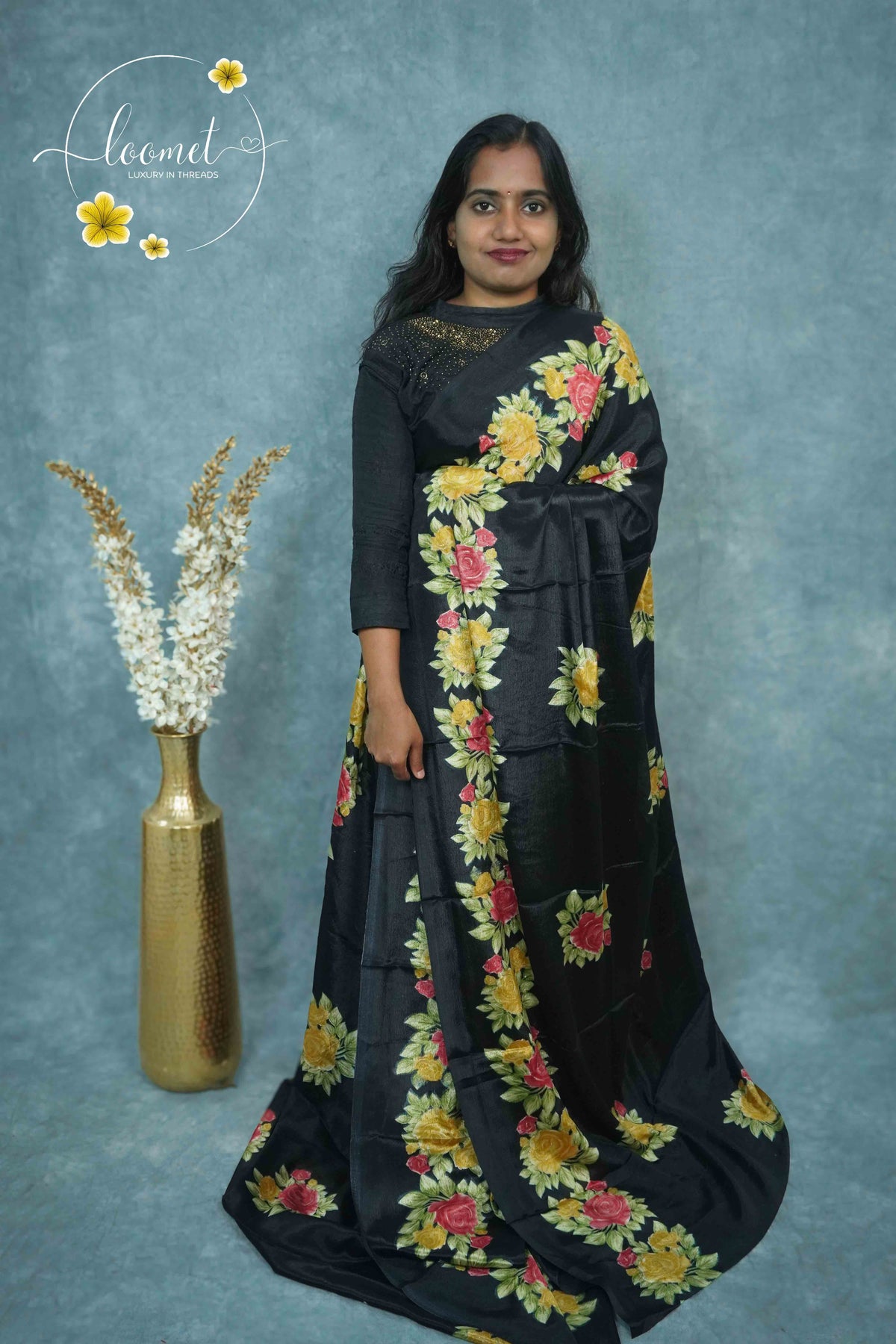 AJF4111 Black Rayon saree with vertical floral creeper pattern.