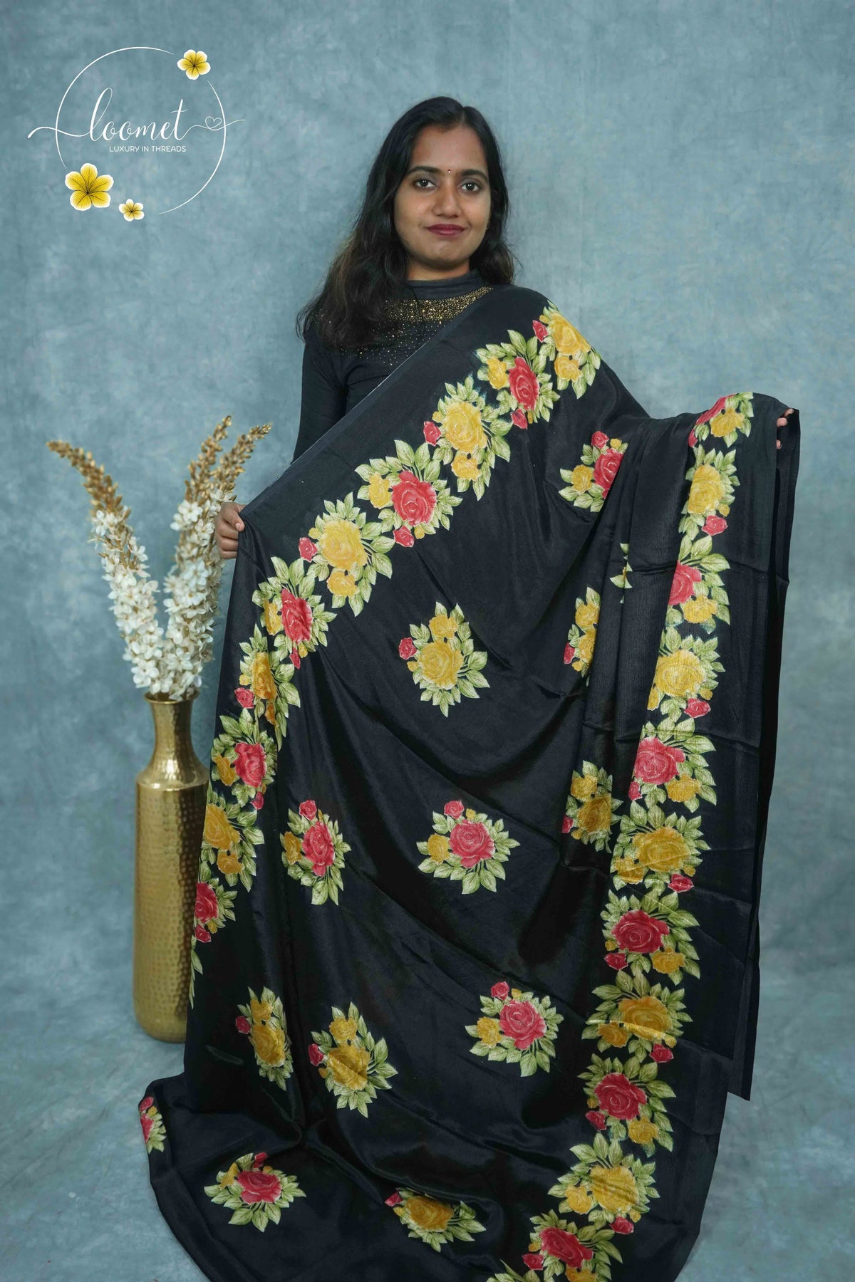 AJF4111 Black Rayon saree with vertical floral creeper pattern.