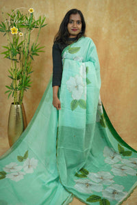 APL0203 Mint Green Semi Organza saree featuring digital floral printed with scalloped gold border.