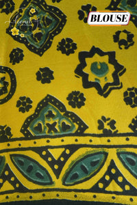 APL0301 Mustard Gold & Charcoal Semi Modal Silk with traditional bird motifs and jharokha pallu.