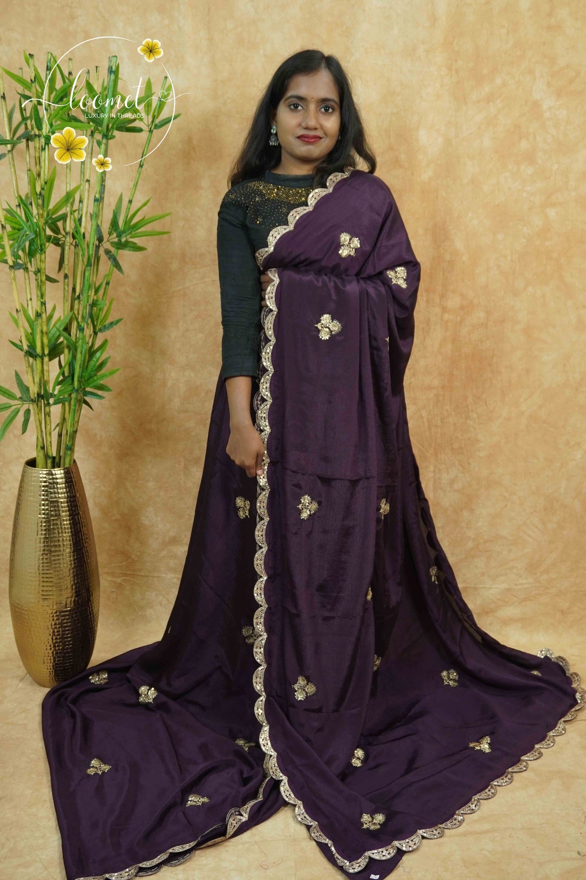 APL0504 Deep Wine Chinnon saree with zardosi-style floral buttas and scalloped cutwork border.