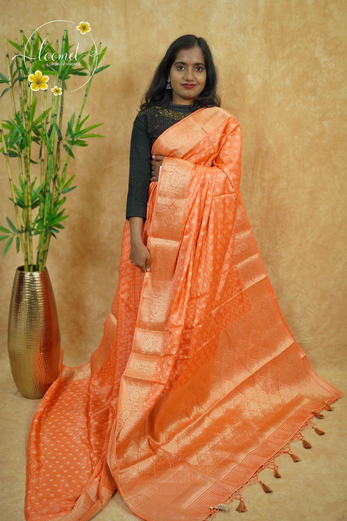 APL10702 Peach-Orange silky georgette saree with an all-over diamond (chowka) grid pattern.
