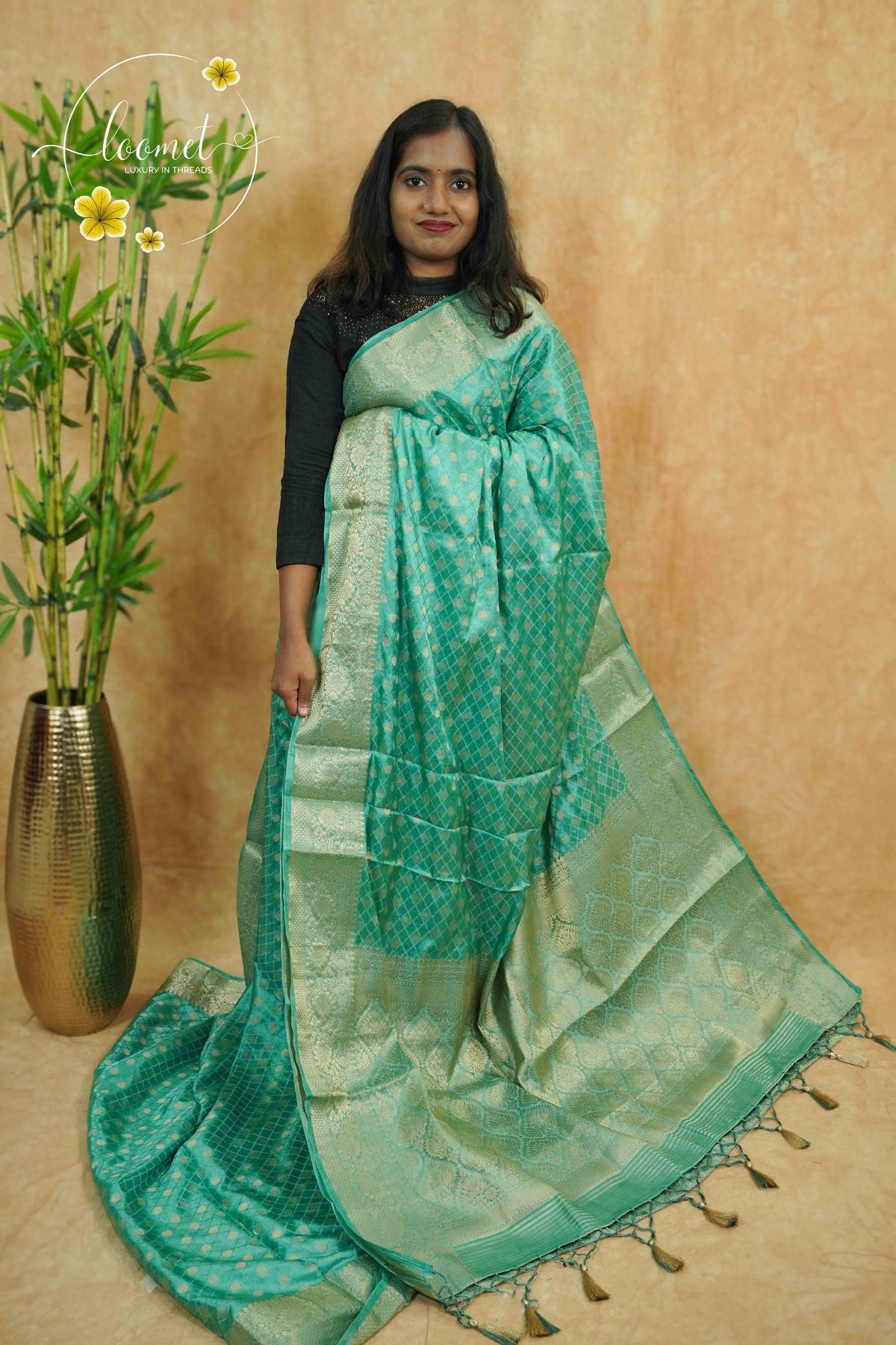 APL10705 Seafoam Green silky georgette saree with an all-over diamond (chowka) grid pattern.
