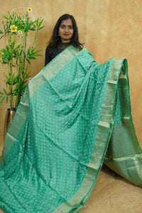 APL10705 Seafoam Green silky georgette saree with an all-over diamond (chowka) grid pattern.