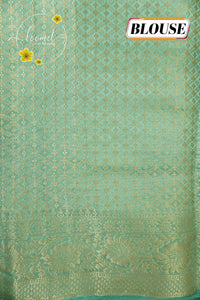 APL10705 Seafoam Green silky georgette saree with an all-over diamond (chowka) grid pattern.