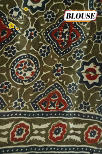APL1121 Earthy Charcoal & Rust Semi Modal Silk saree with ajrakh print intricate geometric block prints and tassels.