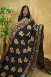 APL1201 Black with multi-colour earth tones viscose saree with contemporary prints and gold banarasi zari border and tassels.