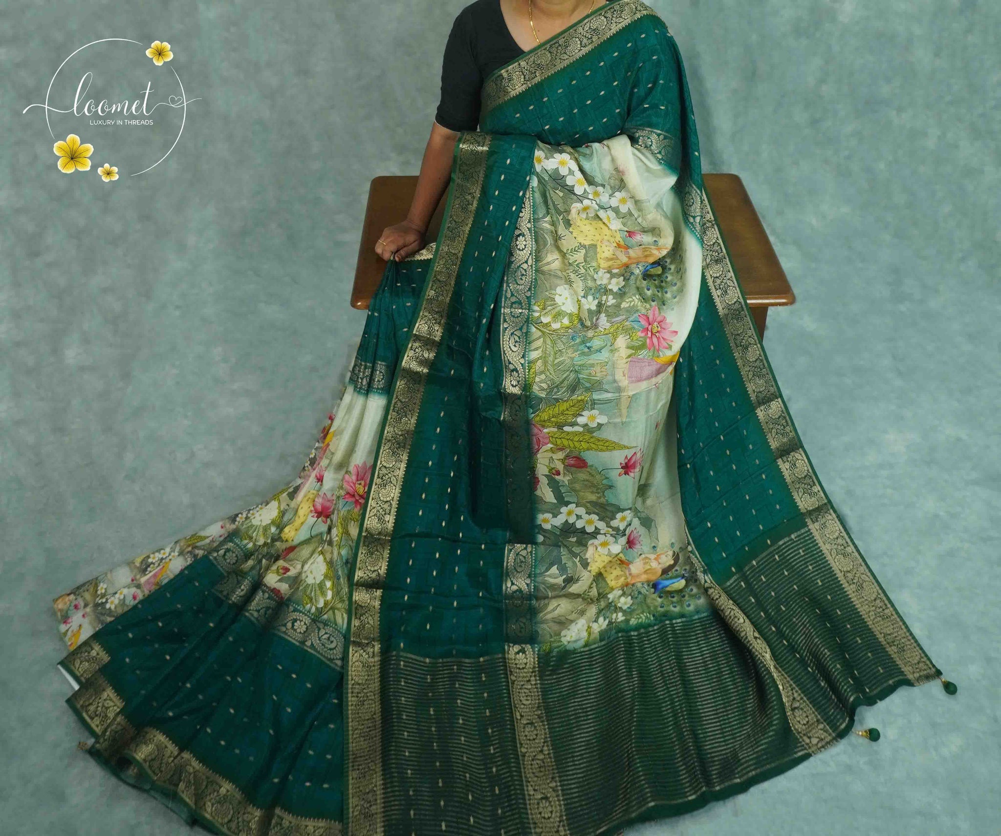 APL1901 Teal green Viscose saree featuring floral garden prints.