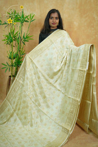 APL20001 White silky georgette saree with an all-over diamond (chowka) grid pattern.