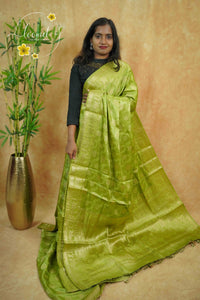 APL20003 Olive Green silky georgette saree with an all-over diamond (chowka) grid pattern.