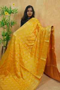 APL20004 Yellow silky georgette saree with an all-over diamond (chowka) grid pattern.