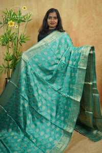 APL20005 Teal Blue silky georgette saree with an all-over diamond (chowka) grid pattern.