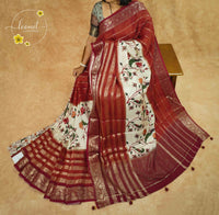 APL2001 Crimson Red Viscose saree featuring ivory Kalamkari bird panels with gold zari stripes.