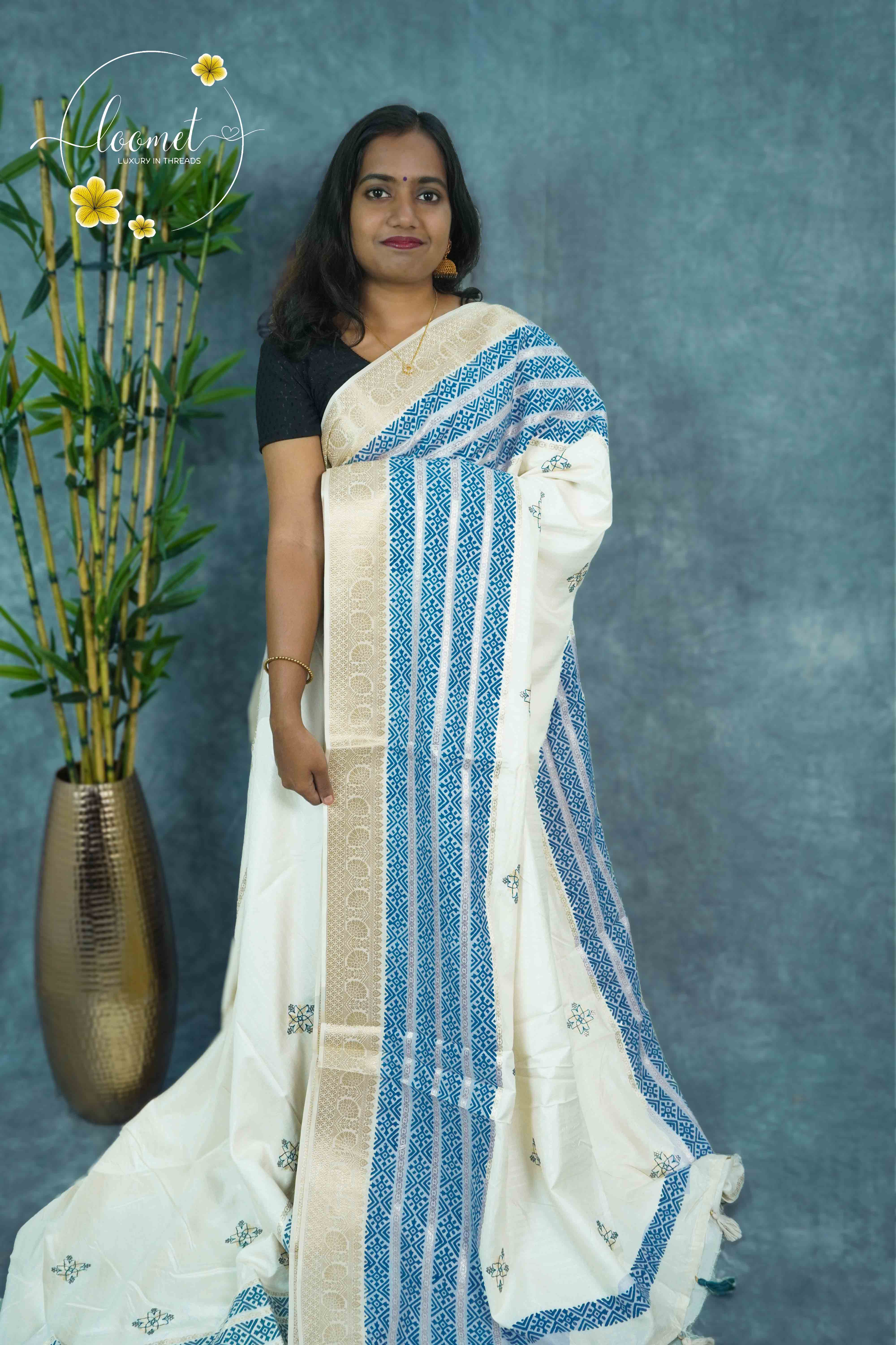 APL20402 Off-White and blue Tussar Silk saree with woven geometric motifs