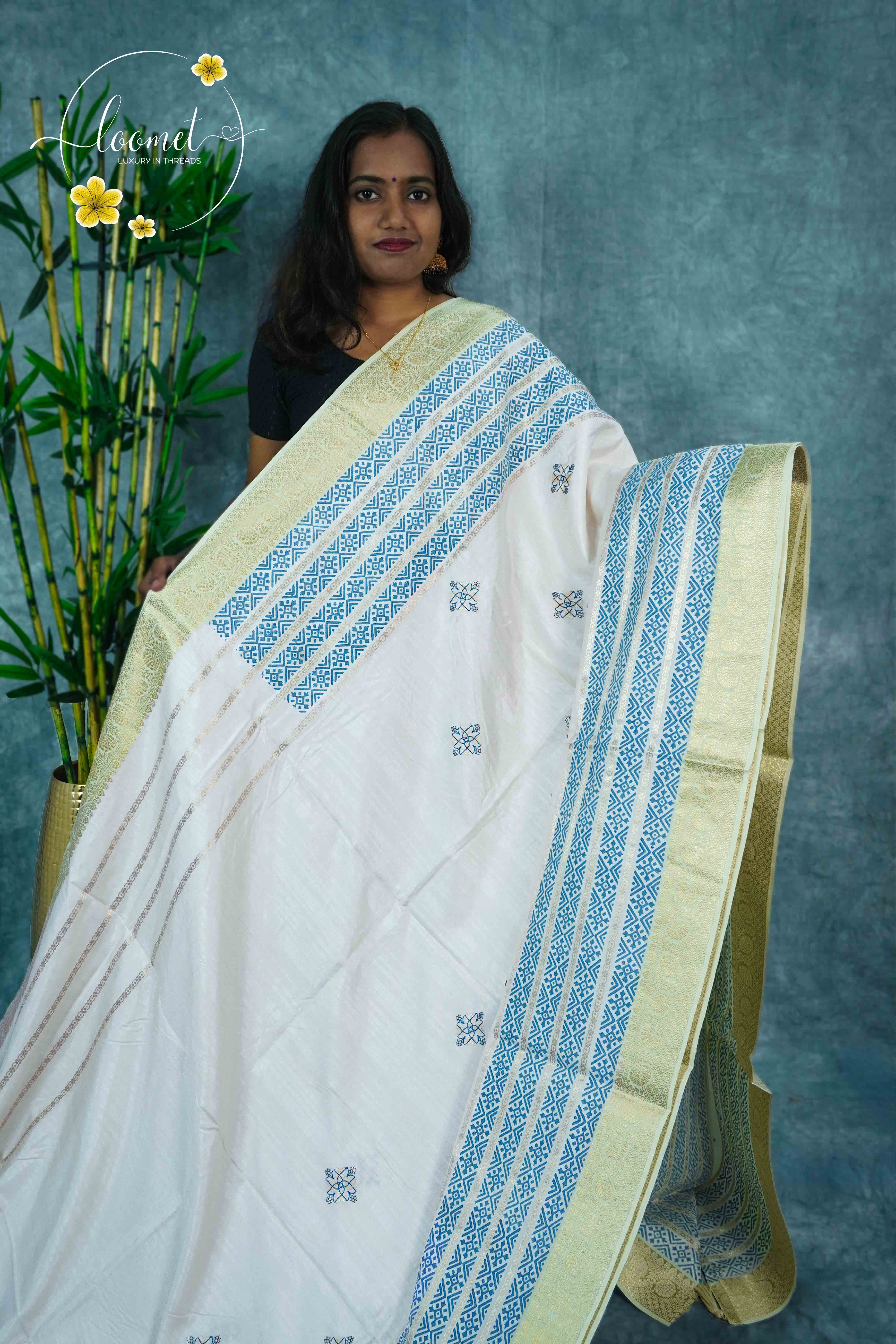 APL20402 Off-White and blue Tussar Silk saree with woven geometric motifs