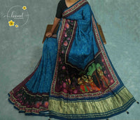 APL26001 Teal blue Pure Dola Viscose saree featuring floral prints and Lagdi Patta Pallu.