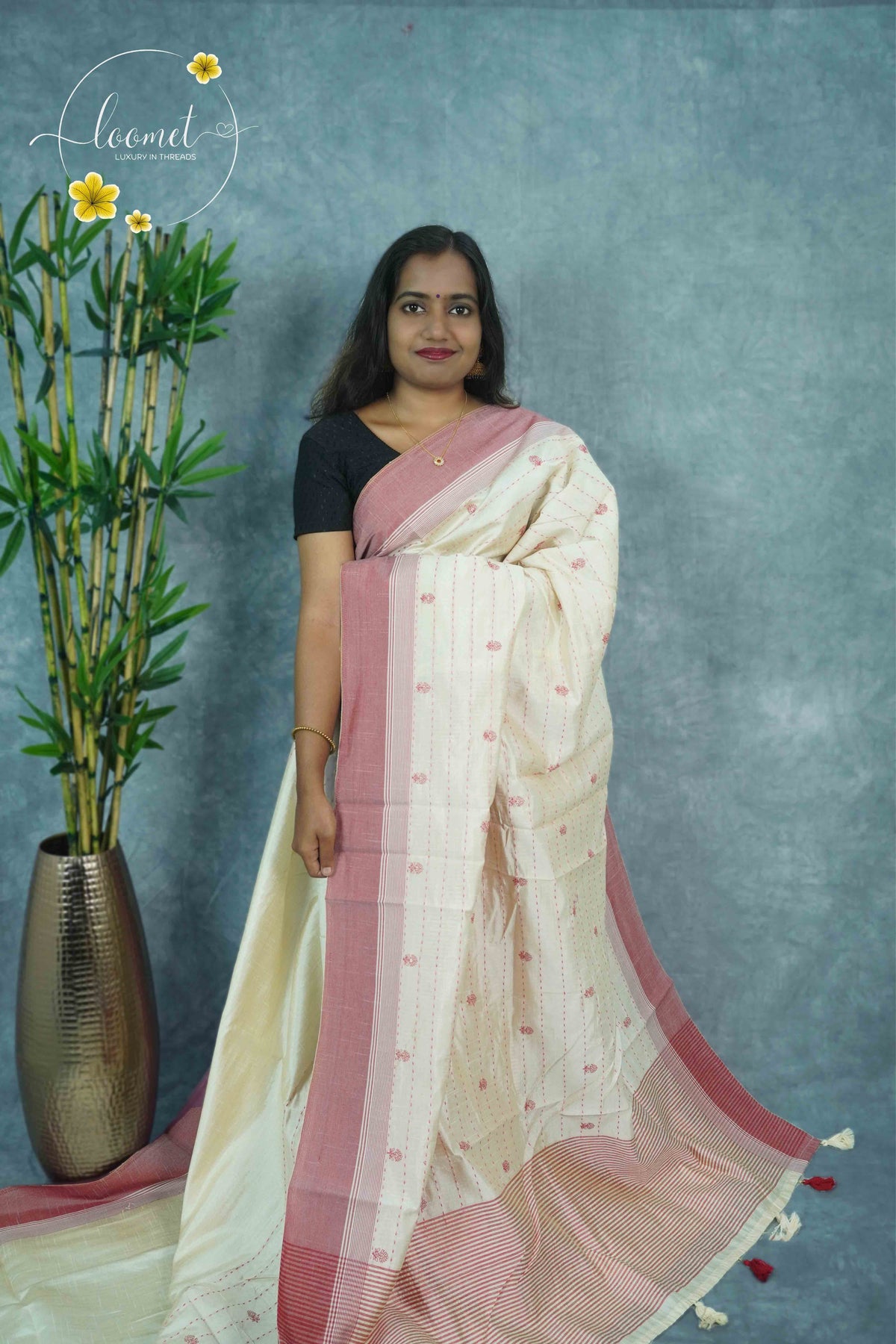 APL3101 Off-White Tussar silk saree with vertical dotted lines and floral buttas.