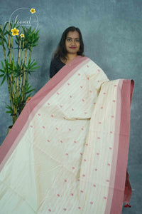 APL3101 Off-White Tussar silk saree with vertical dotted lines and floral buttas.