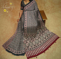 APL3122 Black & Crimson Semi modal silk saree with ajrakh print and handcrafted mirror work.