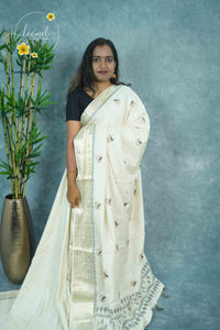 APL3201 Off-White Tussar Silk saree with bird-on-a-branch motif.