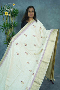 APL3301 Off-White Tussar Silk saree with purple and gold floral bunch buttas