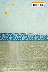 APL3303 Off-White Tussar Silk saree with peacock blue and gold floral bunch buttas