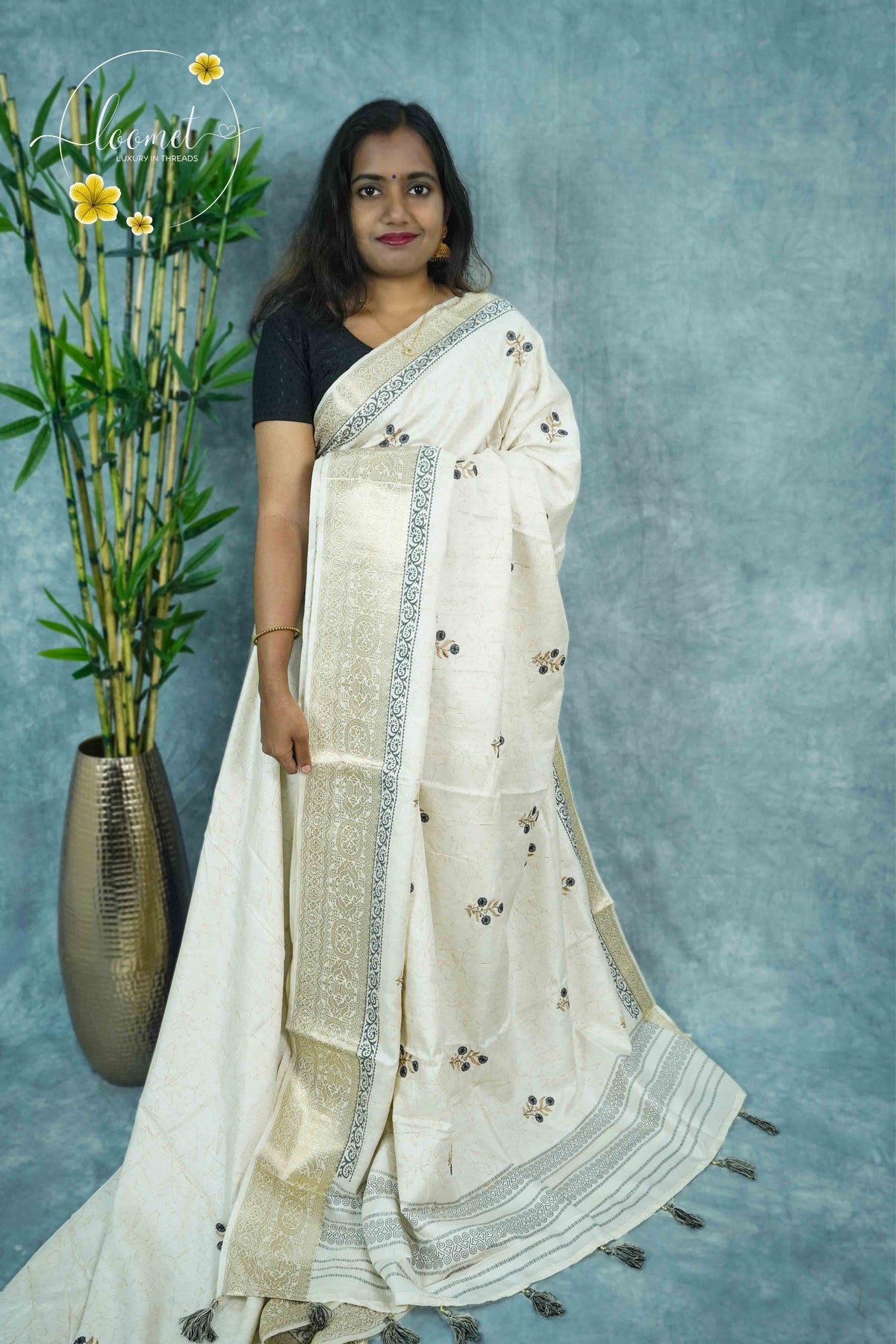 APL3304 Off-White Tussar Silk saree with peacock dark grey and gold floral bunch buttas