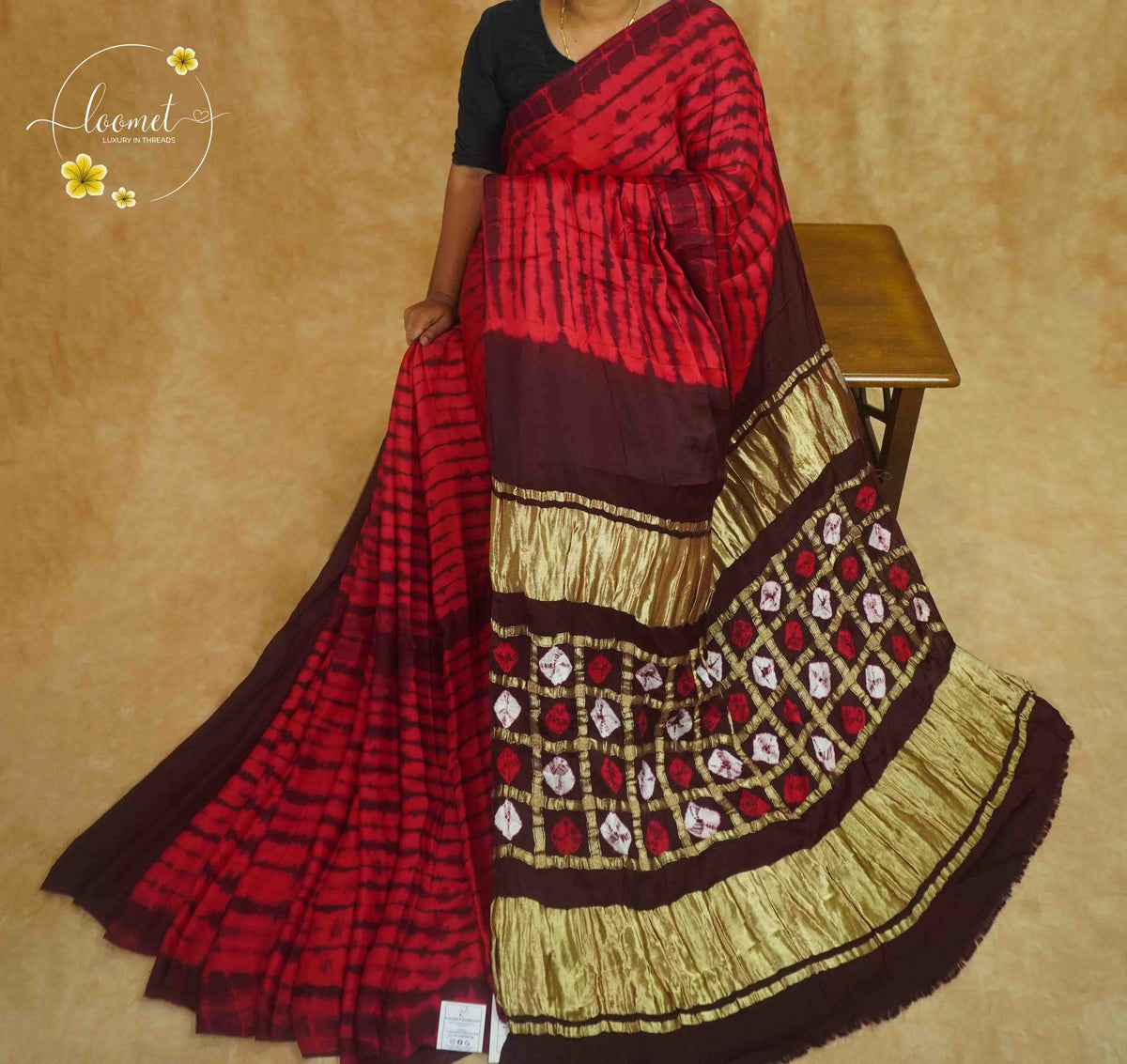 APL4024 Crimson & Deep Coffee Modal saree features with Geometric Grid Pallu and Dual Lagdi Patta.