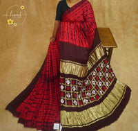 APL4024 Crimson & Deep Coffee Modal saree features with Geometric Grid Pallu and Dual Lagdi Patta.