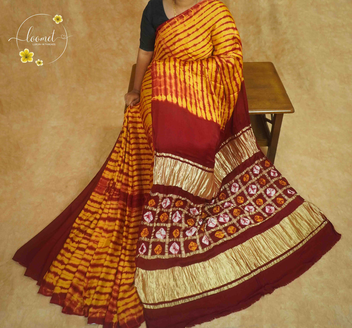 APL4026 Maroon & Mustard Gold Modal saree features with Geometric Grid Pallu and Dual Lagdi Patta.