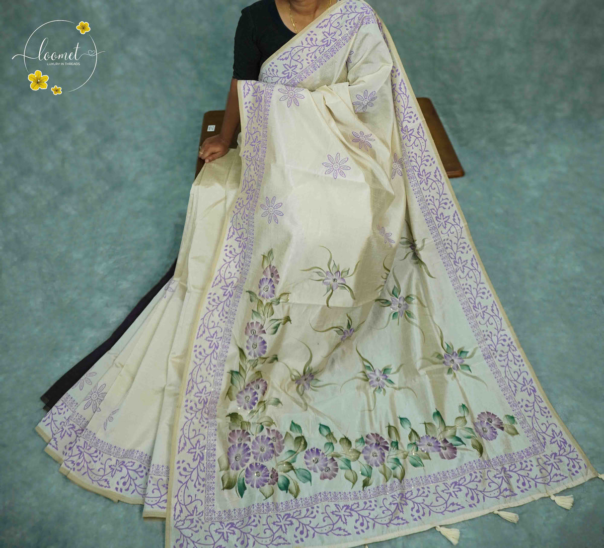APL4401 Off-White Tussar Silk saree featuring hand-painted purple floral motifs, leafy green vines