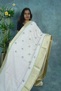 APL4502 Off-White Tussar Silk saree with mehendi green tree-of-life butis.