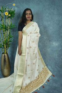 APL4503 Off-White Tussar Silk saree with ochre tree-of-life butis.