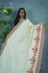 APL4701 Cream Tussar Silk saree with multicolored Kathakali-style motifs