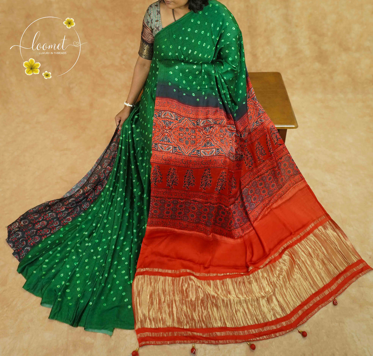 APL4901 Emerald Green & Rust Red Pure Dola Viscose saree with Bandhej-style Pattern.