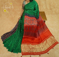 APL4901 Emerald Green & Rust Red Pure Dola Viscose saree with Bandhej-style Pattern.