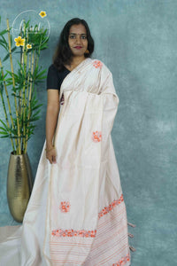 APL6001 Pastel Peach Tussar Silk saree with floral embroidery buttas.