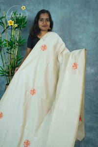 APL6001 Pastel Peach Tussar Silk saree with floral embroidery buttas.