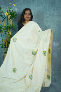 APL6003 Off-White Tussar Silk saree with circular floral embroidery butta.