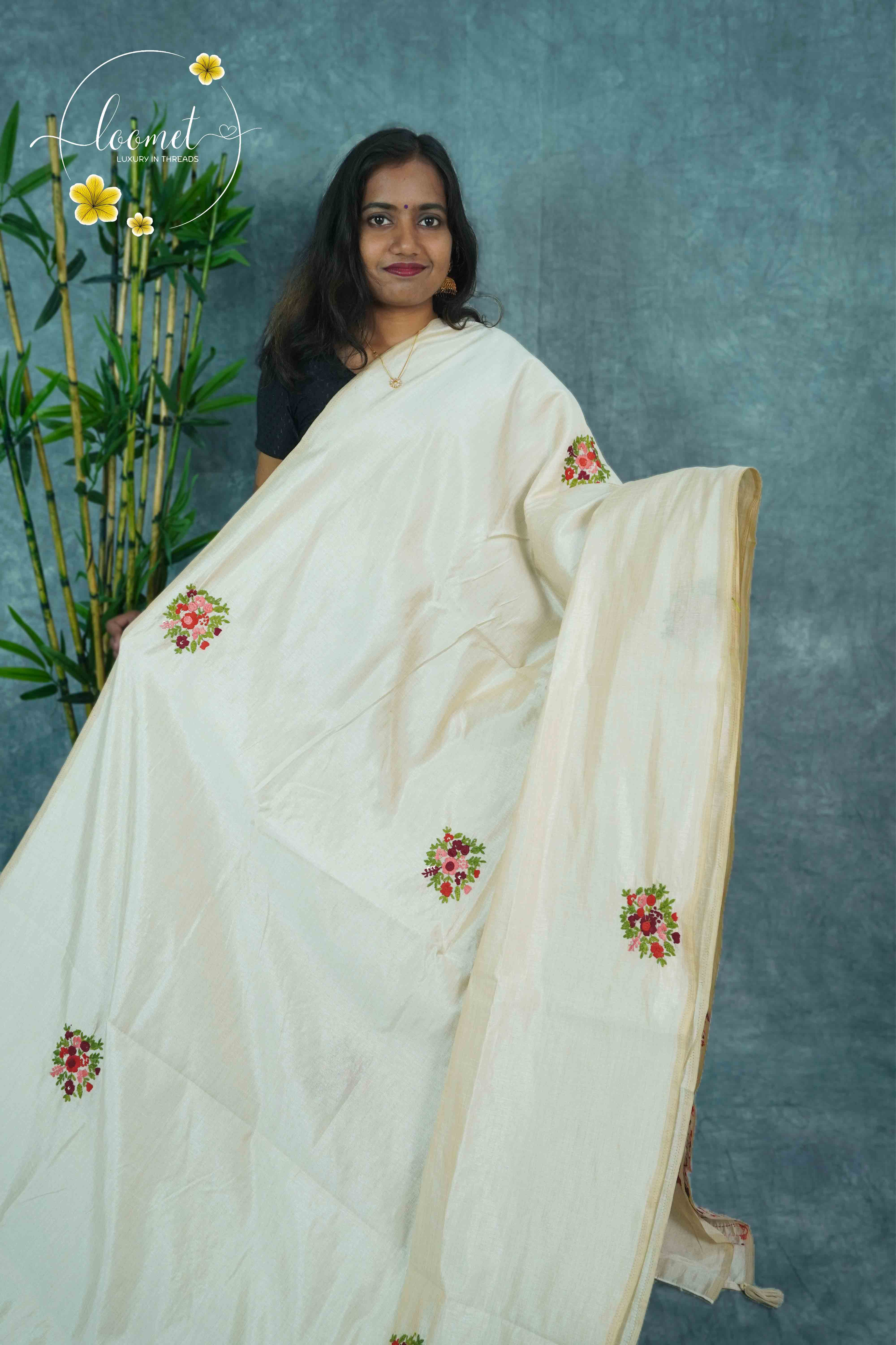 APL6004 Off-White Tussar Silk saree with larger floral bouquet motifs embroidered buttis