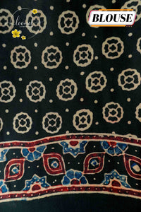 APL6122 Black Semi Modal Silk with ajrakh print geometric star medallions and spire pallu.