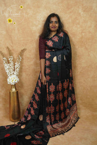 APL6801 Jet Black Semi Modal silk with paisley-inspired floral motifs.