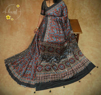 APL7123 Elegant black semi modal silk saree with red and blue Ajrakh prints and handcrafted Mirror work