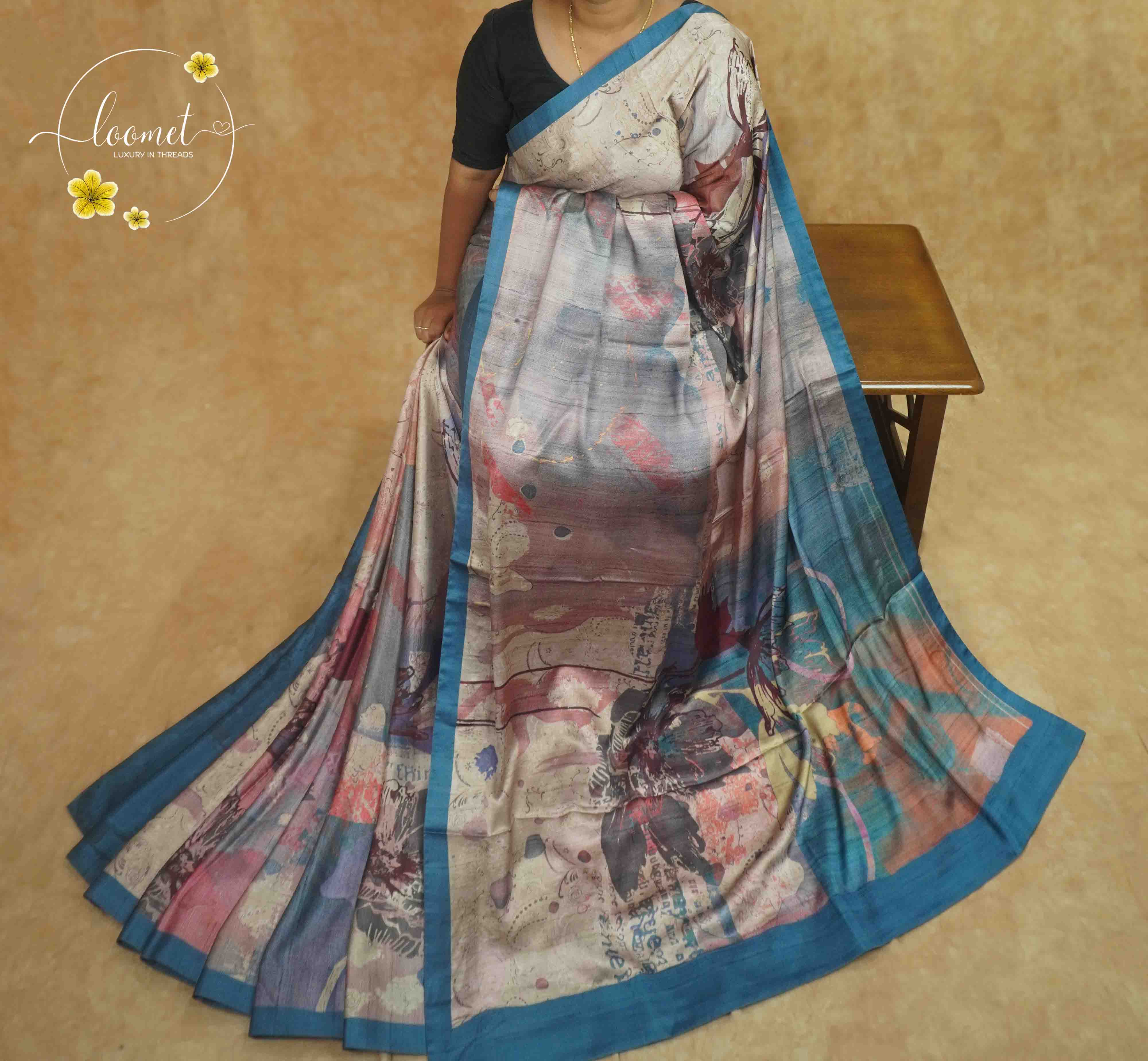 APL80001 Misty Silver & Teal Blue Modal Stain saree with floral digital print.